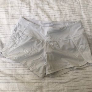 White Lululemon running shorts